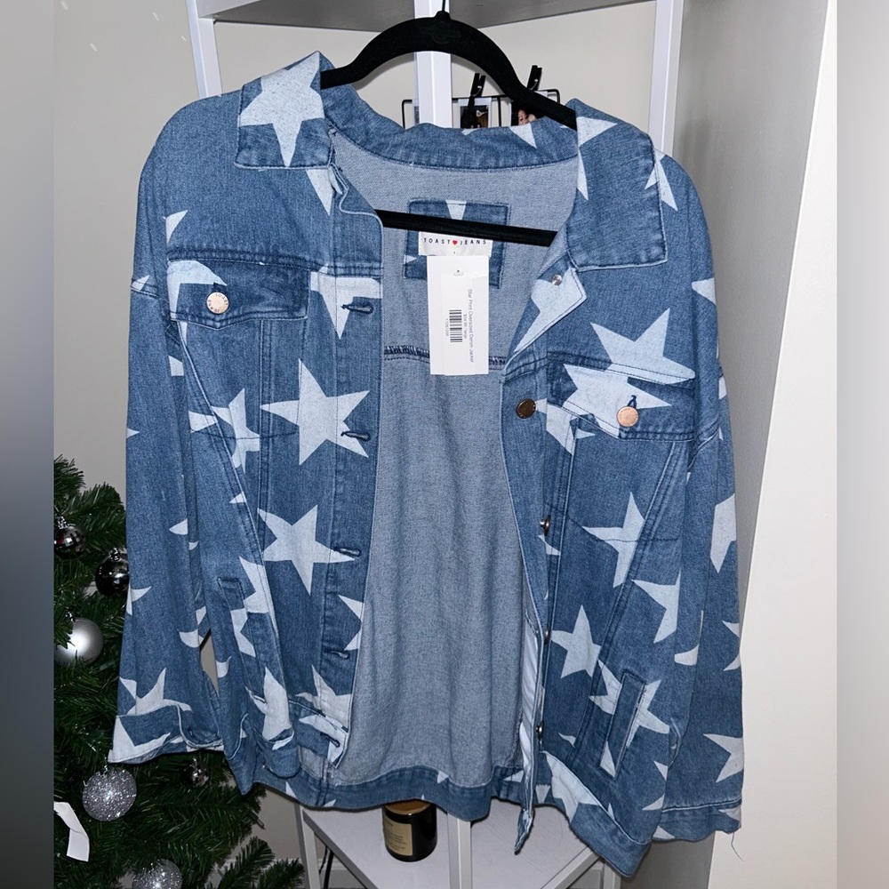 Star print jean jacket, never worn, size L